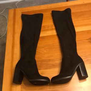 Faux sued over the knee boots.
